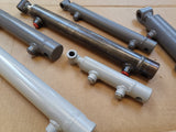 Hydraulic cylinders with cross bores of various sizes